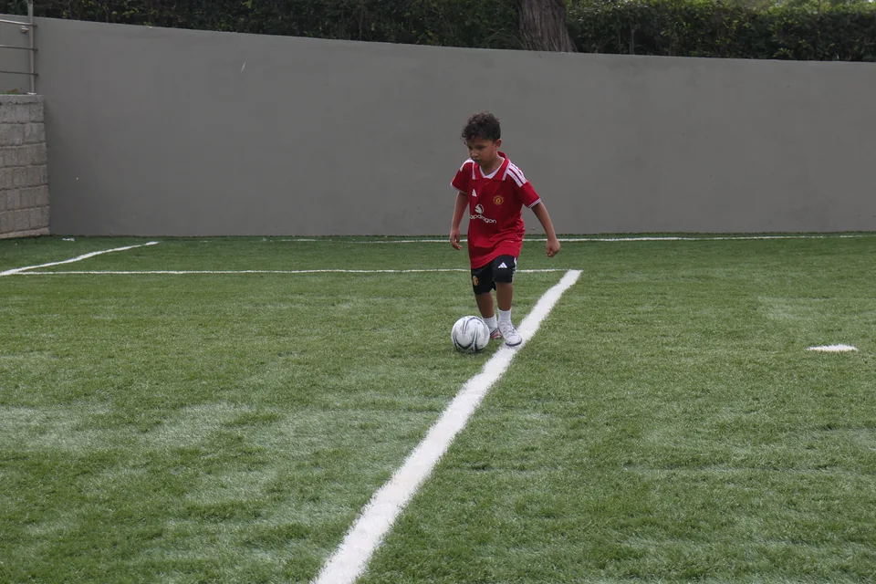 Altamira student playing soccer
